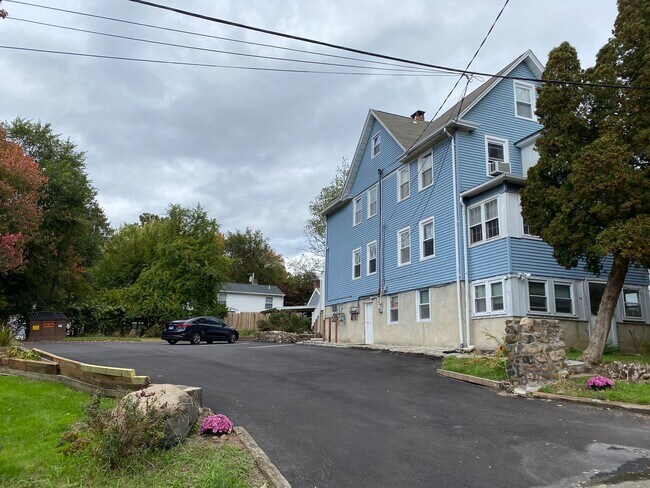 well-lit large parking area - 48 Allen Ave Unit C Third Floor