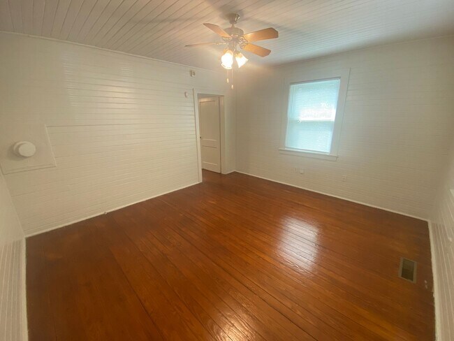 Photo - Walltown duplex with gleaming floors, a front porch, and a large pantry — all under $1,300. Unit B