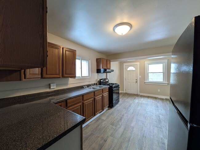 Photo - Large 4 Bedroom Home with Garage, Deck, & Fence!