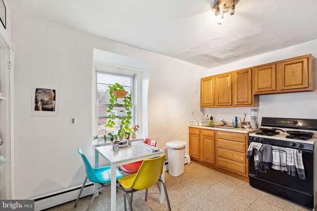 Building Photo - 4819 Walton Ave Unit 3