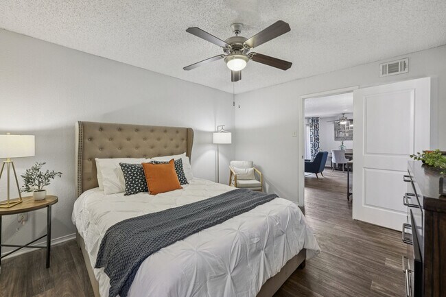 Bedroom with ceiling fan flow