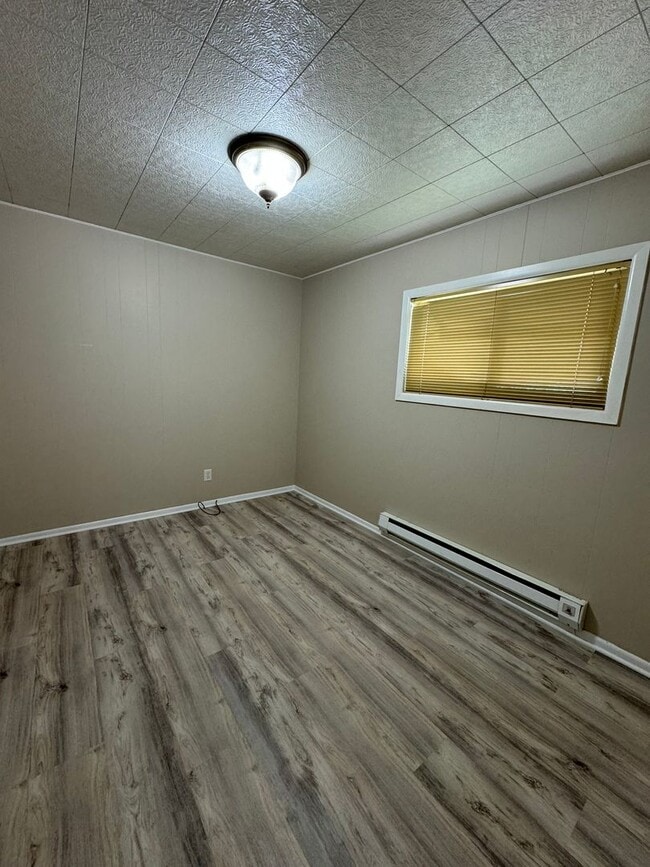 Photo - 2 bed 1 bath house with water,sewer, garbage and lawn care included!