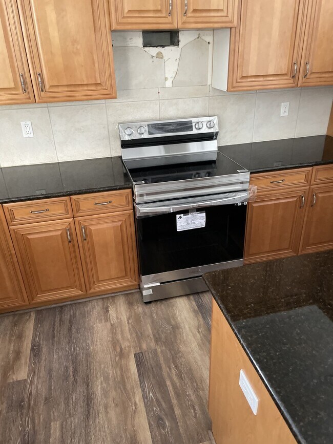 Photo - "Elegant 3-Bed, 3-Bath Home with a heated ...