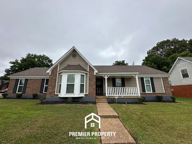 Building Photo - Charming 3BR/2BA Near Southwind | Vaulted Ceilings, Hardwood Floors & 2-Car Garage