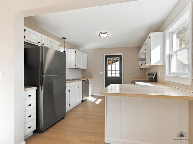 Photo - Spacious 4-Bedroom Home with Garage & Modern Heating for Rent in Waterville