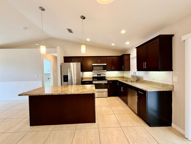 Photo - Move-In Ready 3BR Home in SW Cape Coral with Fenced Yar+Screened Lanai+Lawn Care Included+Pet Fri...
