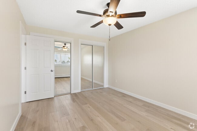 2BR, 1BA - 850SF - Primary Bedroom - Twin Fountain Apartments