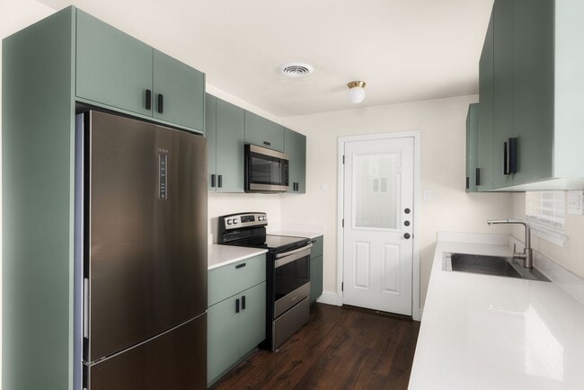 Photo - **Remodeled 2/1 Duplex in Southeast Austin – Modern Style, Open Layout, and Prime Location!**