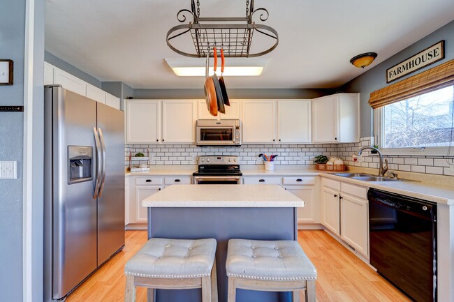 Photo - Evolve Real Estate: Available 06/03/2026 Beautiful 3 Bedroom + Loft + Finished Basement in the Po...