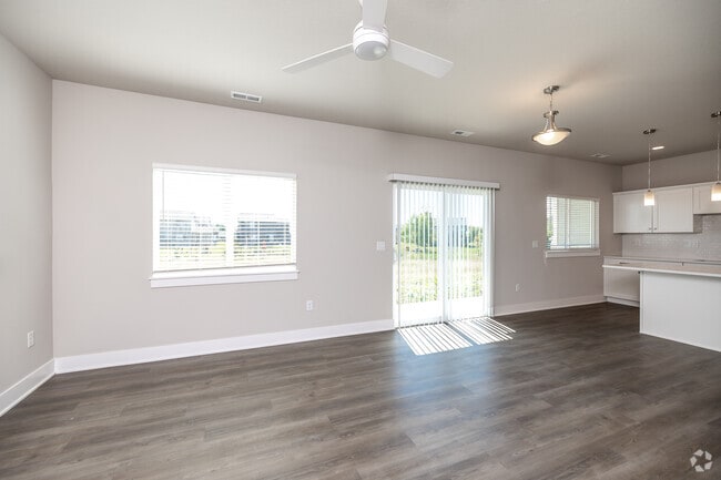 3BR, 2.5BA - 1,600 SF - Living Room - James Point Luxury Townhomes