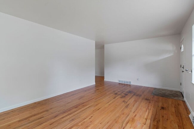 Photo - Student Friendly! Spacious 5 Bedroom, 2 Bath Home with Finished Basement and Attached Garage