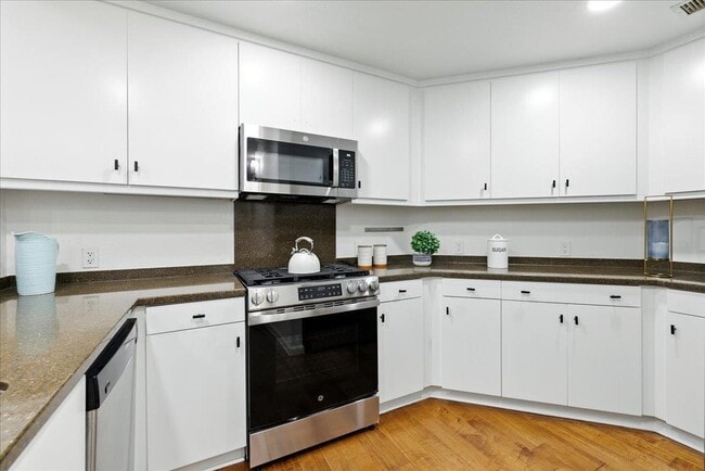 Building Photo - 10745 N De Anza Blvd Unit 115