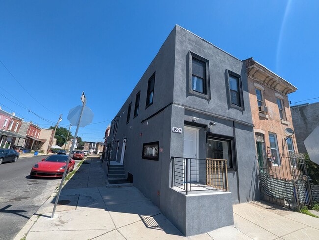 Building Photo - 4995 W Thompson St Unit 2F