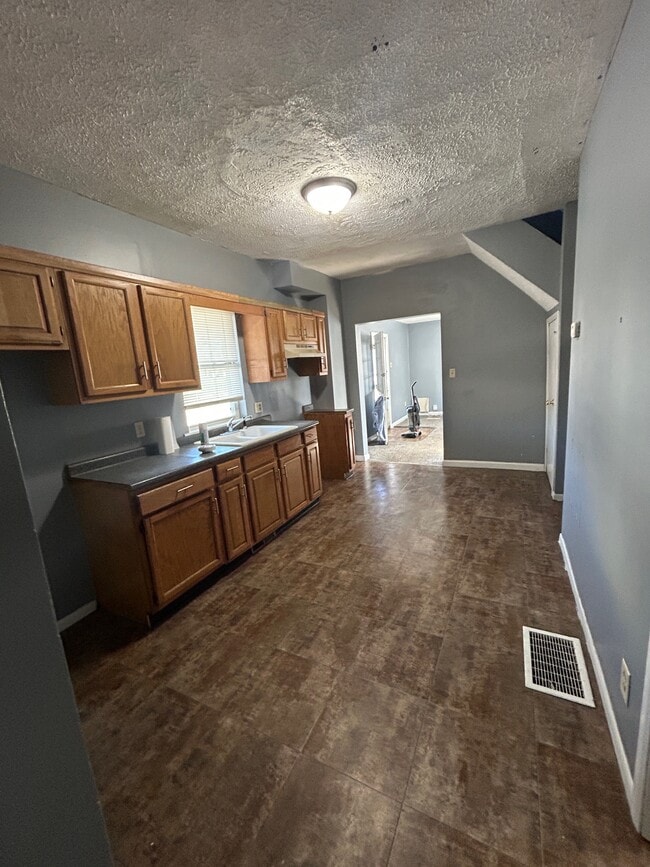 Photo - 101 W 1st St House