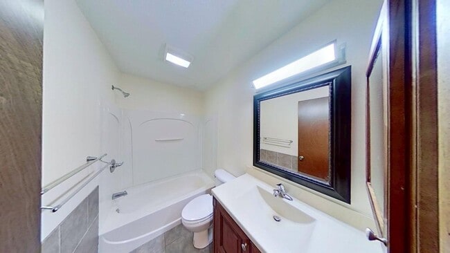 Photo - Updated two bedroom duplex, new stainless steel appliances, garage, and hardwood floors