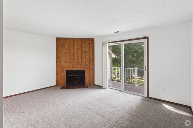 2BR, 2BA - 1,000SF - Living Room - Pine Tree Village Apartments