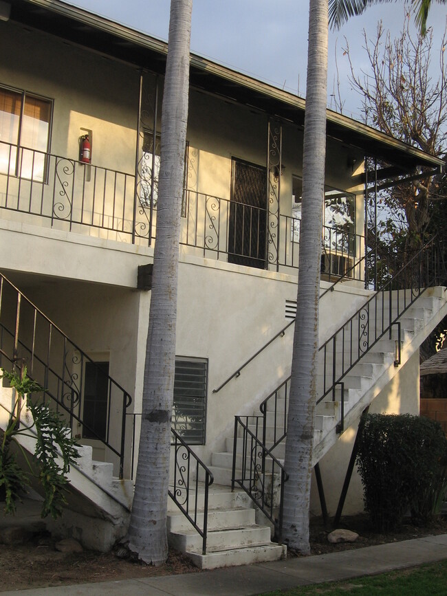Unit accessible via stairs; shared laundry room located on ground floor. - 6230 Milton Ave Apartments