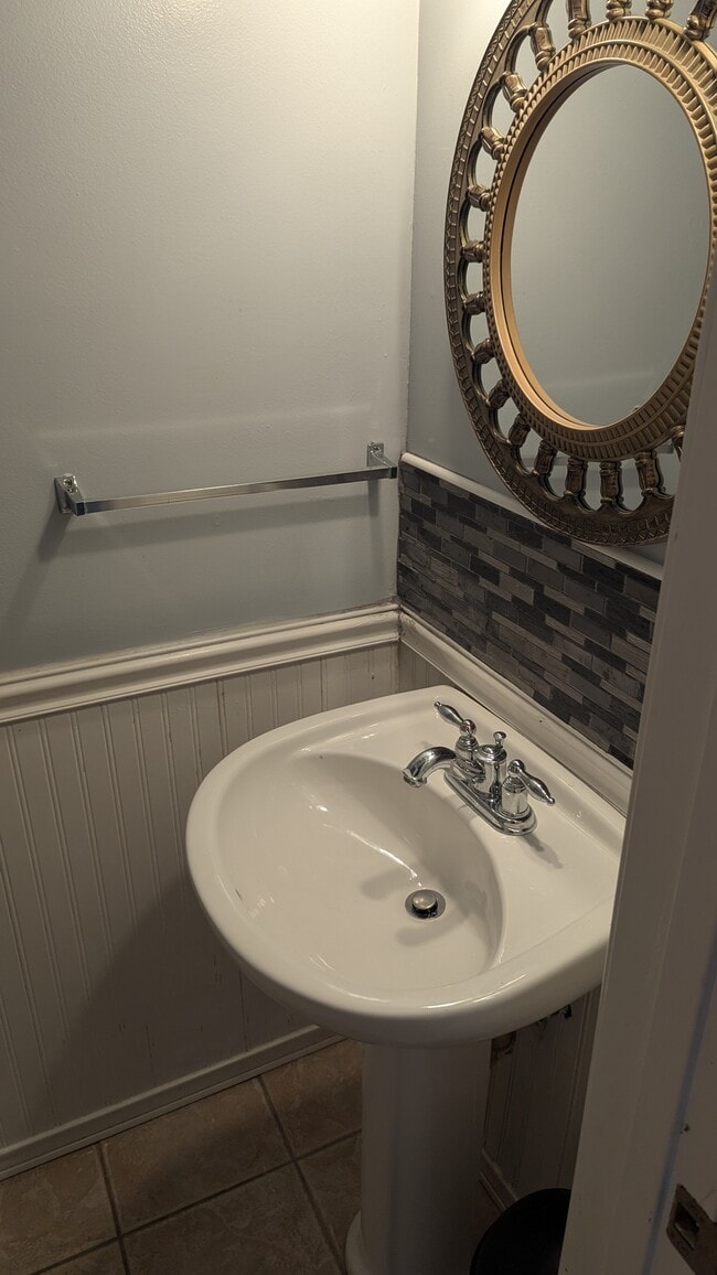 Downstairs half bath - 2294 White Cornus Ln