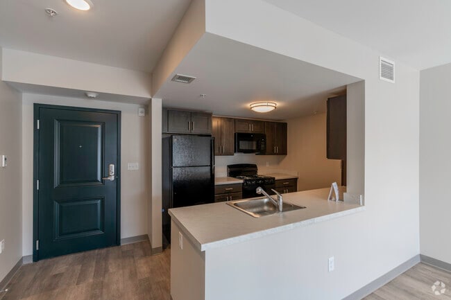Building E #34: 1BR 1BA, Kitchen - WOODLAND COVE