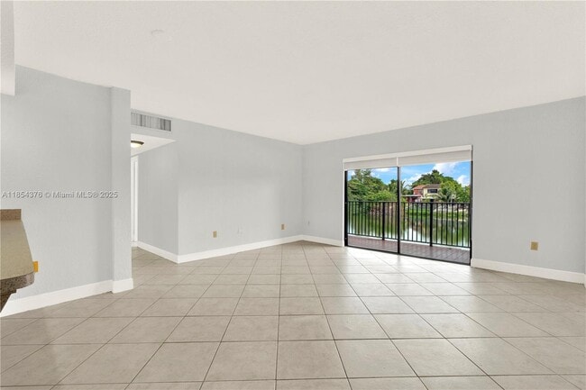 Photo - 1335 W 68th St Unit 207