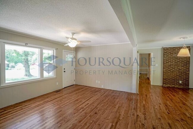 Photo - Charming 3-Bed / 1.5-Bath Ranch Home with large Yard & Off-Street Parking – Near White Oak Crossing