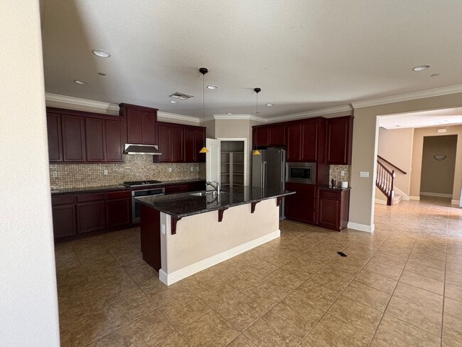 Photo - Large executive home close to Questa school!