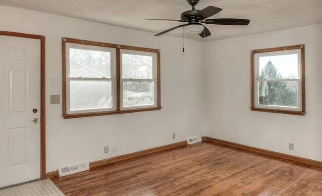 Photo - Bright & Spacious 3-Bedroom Duplex Unit on Large Corner Lot with Wood Floors & Garage!