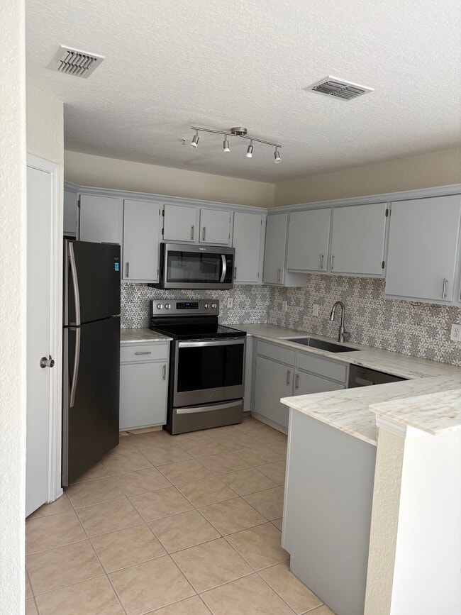 Photo - 1701 The Greens Way Unidad 222