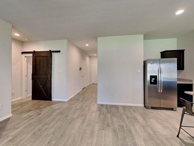 Photo - Chapel Creek Beauty with Designer Kitchen, Spacious Layout & Private Backyard Retreat!