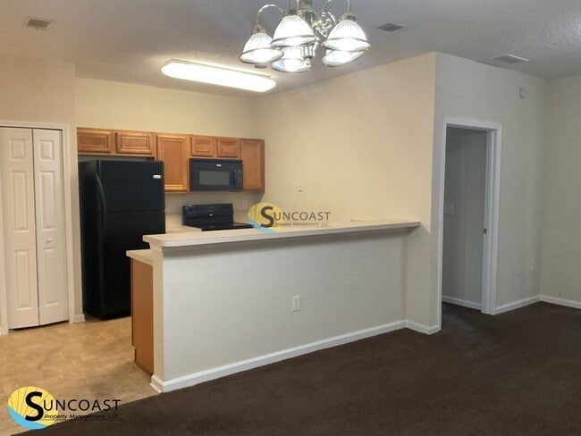 Photo - 6985 Ortega Woods Dr Unidad 3