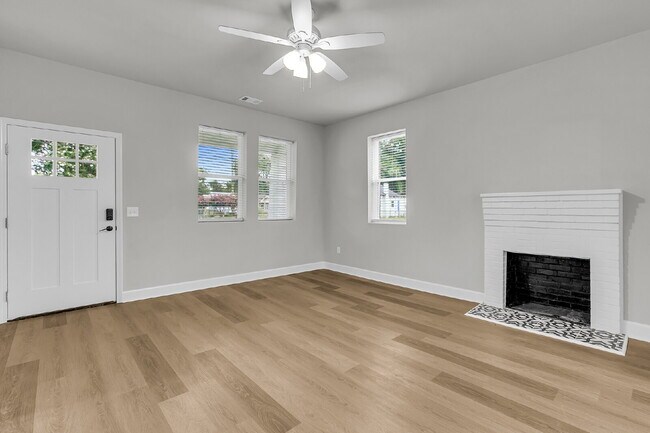 Photo - Cute all brick ranch on a large corner lot with fenced in yard and 1 car garage