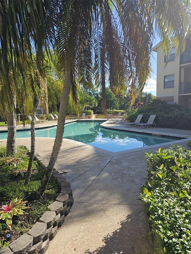 Building Photo - 9999 Summerbreeze Dr Unit 215 Rental