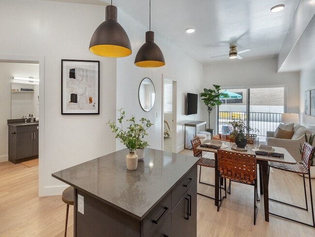 Kitchen into Living Room - Maye House Apartments
