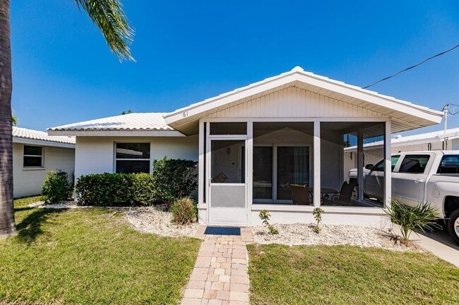 Building Photo - 6020 Midnight Pass Rd