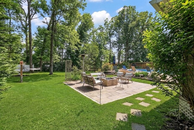 Photo - Beautiful home with a pool
