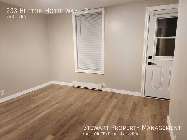 Photo - 233 Hector-Hotte Wy Unit 2