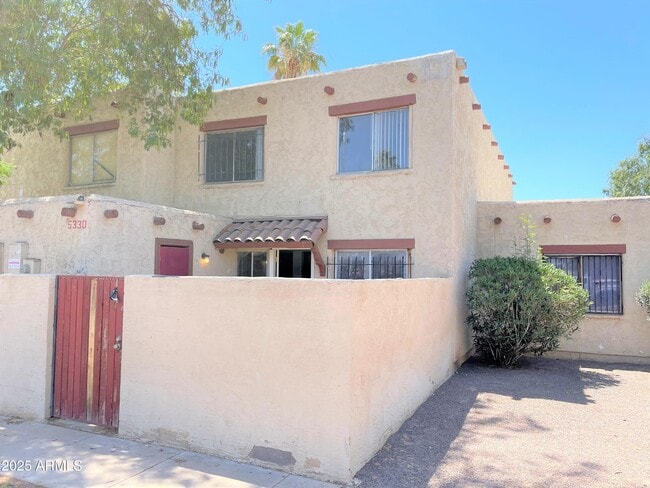 Building Photo - 5330 W Belleview St Rental