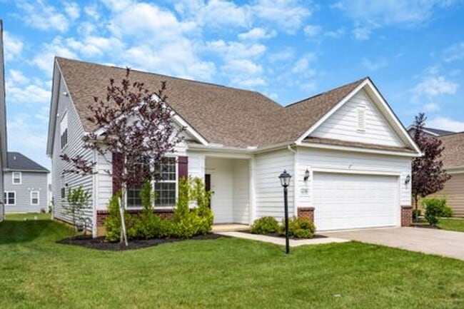 Photo - Updated 3-Bedroom Home with 3 Baths, Open-Concept Layout, Luxury Flooring & Bright Modern Kitchen