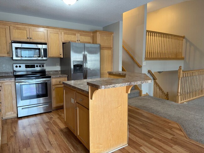 Photo - Spacious 3BR / 3BA Townhome with 2-Car Garage – Available Mid-March!