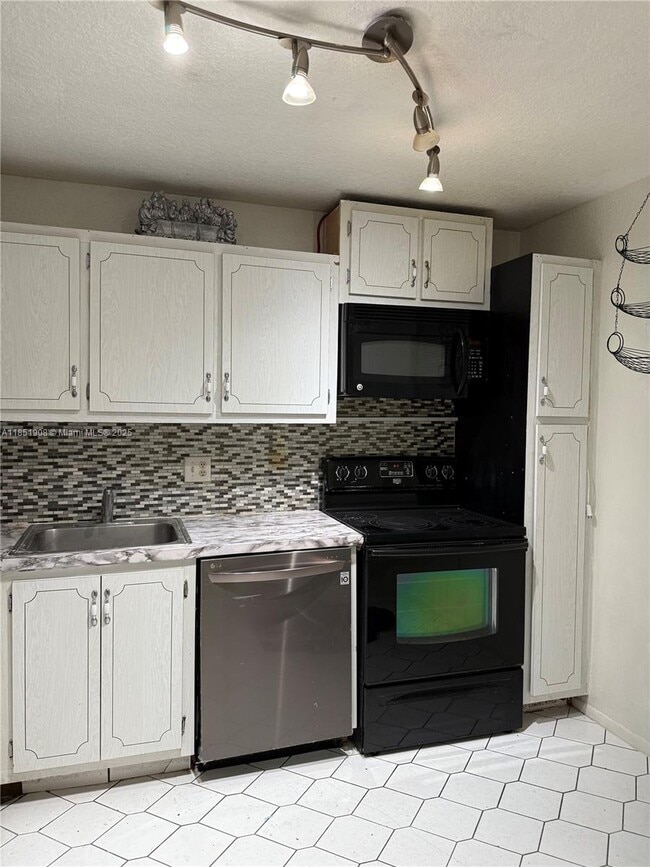 Building Photo - 8390 Sands Point Blvd Unit F106 Rental
