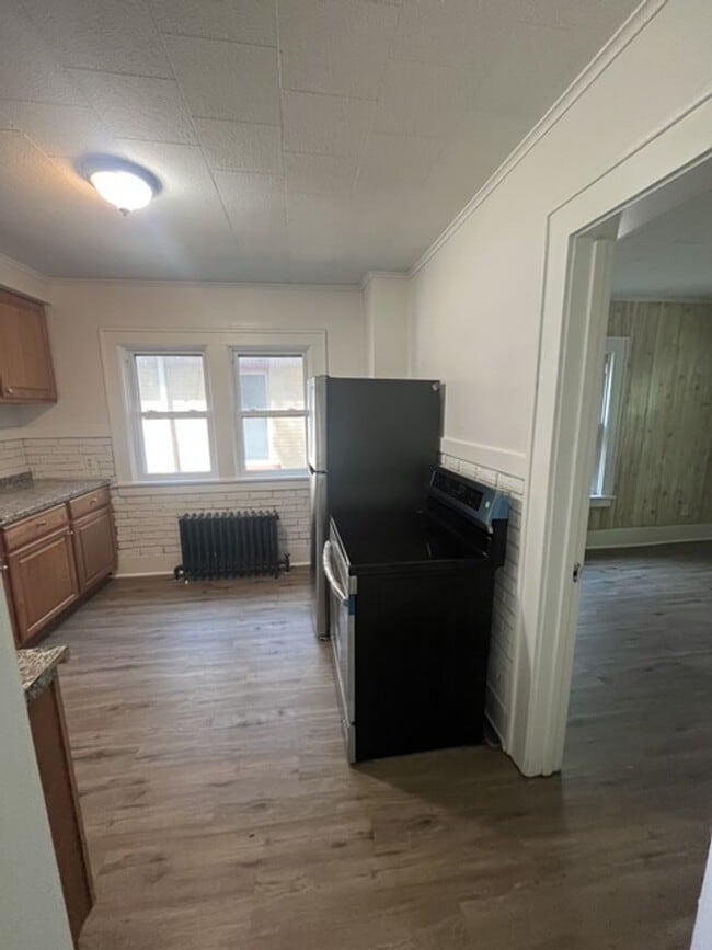 Photo - 3-Bed Home w/ Driveway & Enclosed Porches – Convenient Rochester Location
