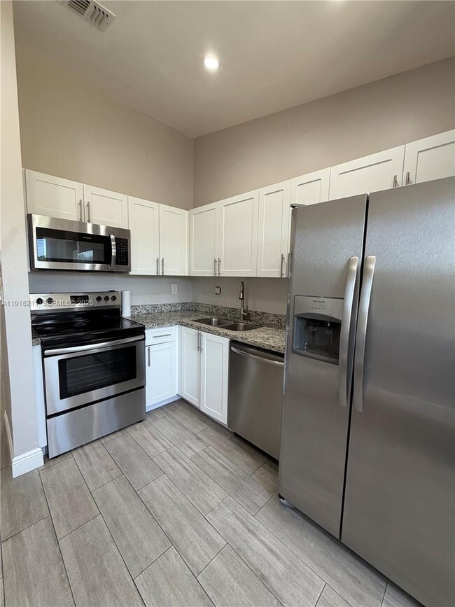 Building Photo - 15501 SW 133rd Pl Unit 804