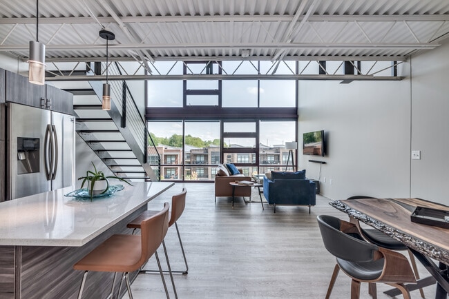 Open Loft with a wall of windows - 367 Auden Ave Condo Unit 311