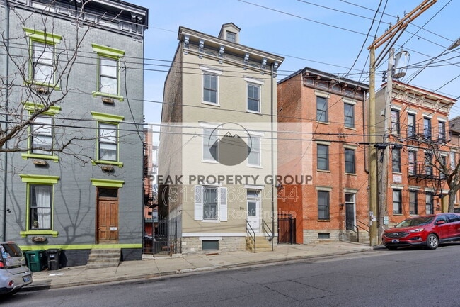 Building Photo - 516 E 13th St Unit 4