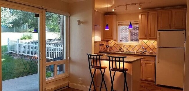 Photo - One Bedroom Condo Walking Distance to CU with Fenced Backyard and Flatiron Views!