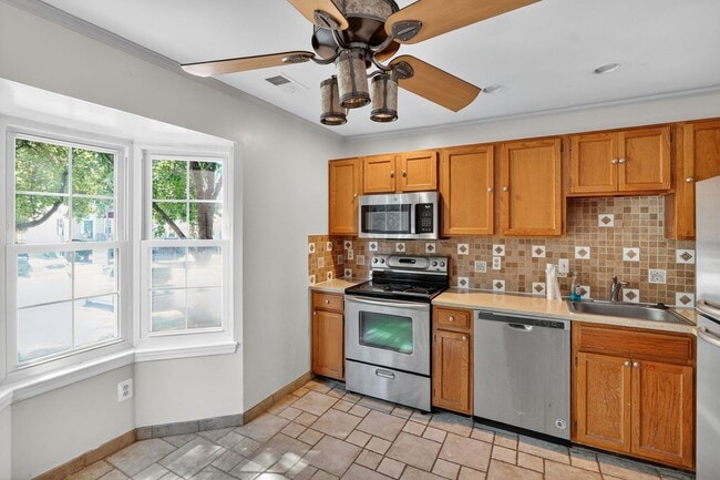 Photo - Ideal Rental: 3BR/2.5BA with Washer/Dryer, Parking & Pool Access