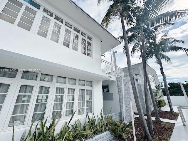 Building Photo - 7445 Harding Ave Unit 112