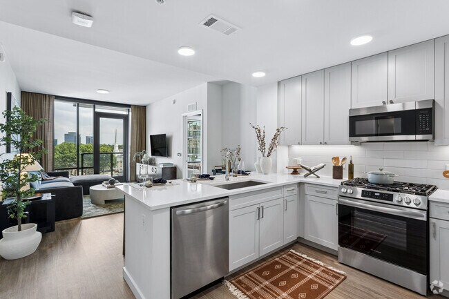 B2 2BR, 2BA - 1,021SF - Kitchen/Living Room