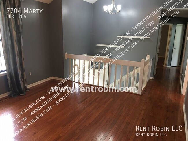 7704 Marty-