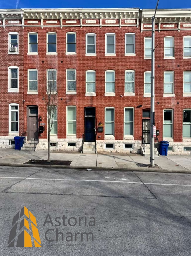 Photo - Beautifully Renovated 3BR Rowhome Near Johns Hopkins – Gated Parking + Modern Upgrades